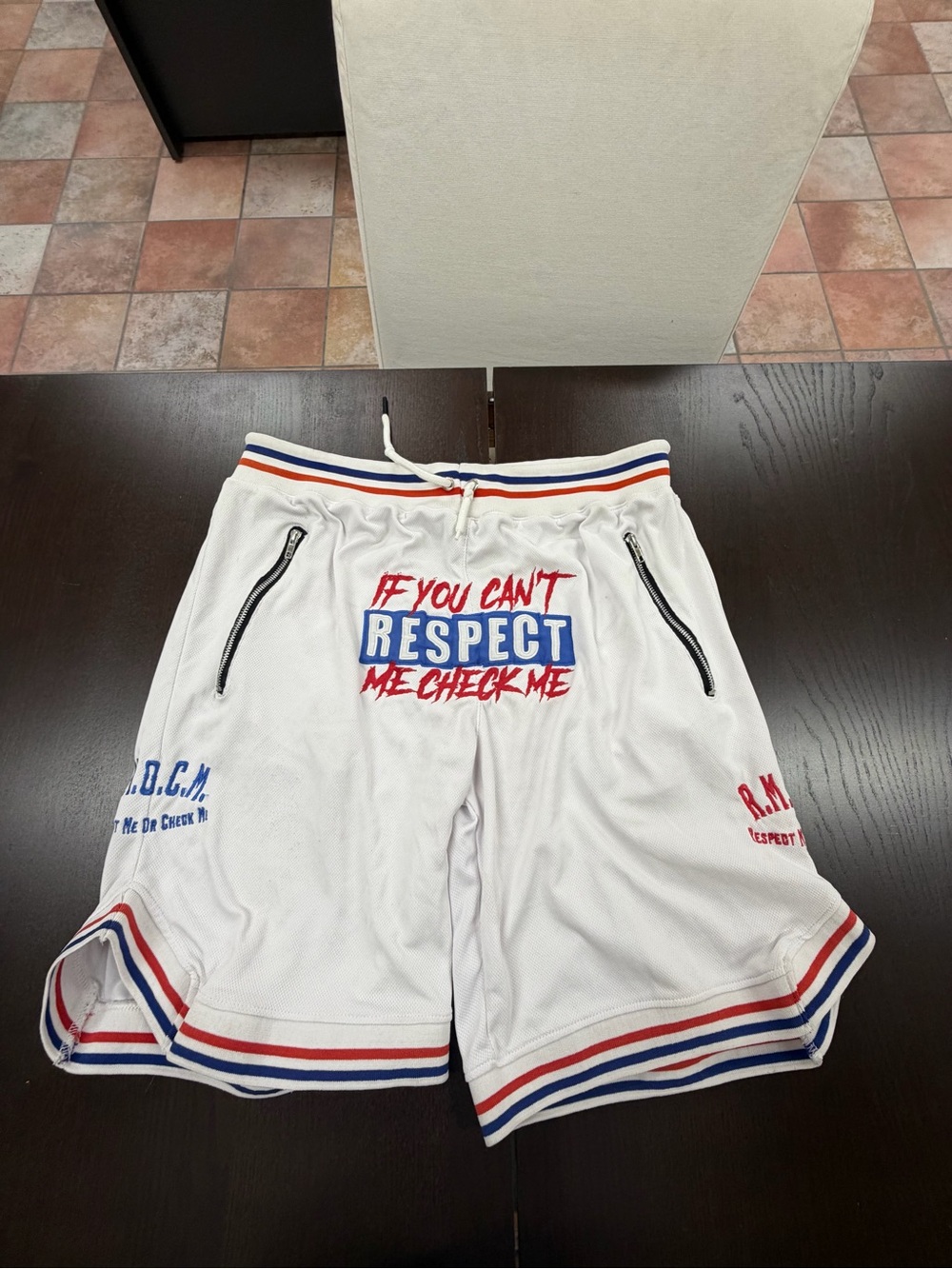 One pair of size large basketball shorts